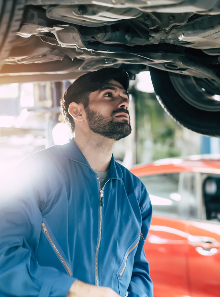 Mechanic inspecting a vehicle - MOT North London